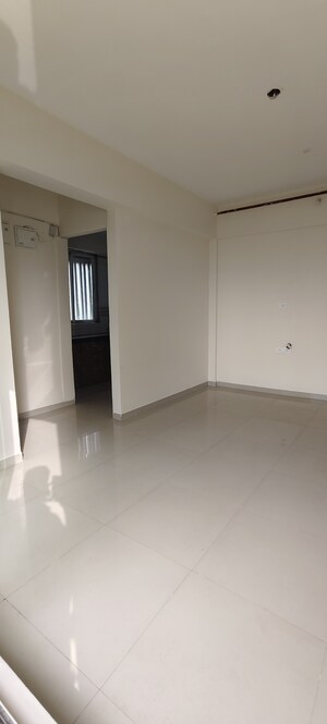 Living Room in 1 BHK Apartment at Tanvi Eminence, Mira Road – for Sale