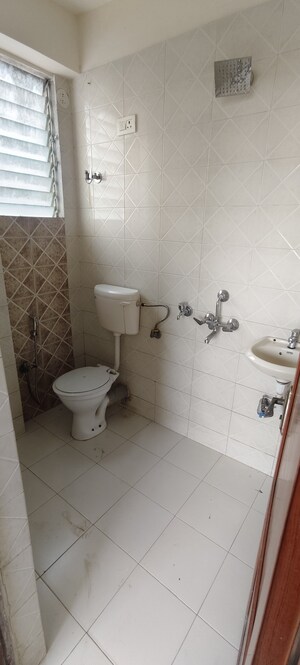 Bathroom in 1 BHK Apartment at Tanvi Eminence, Mira Road – for Sale