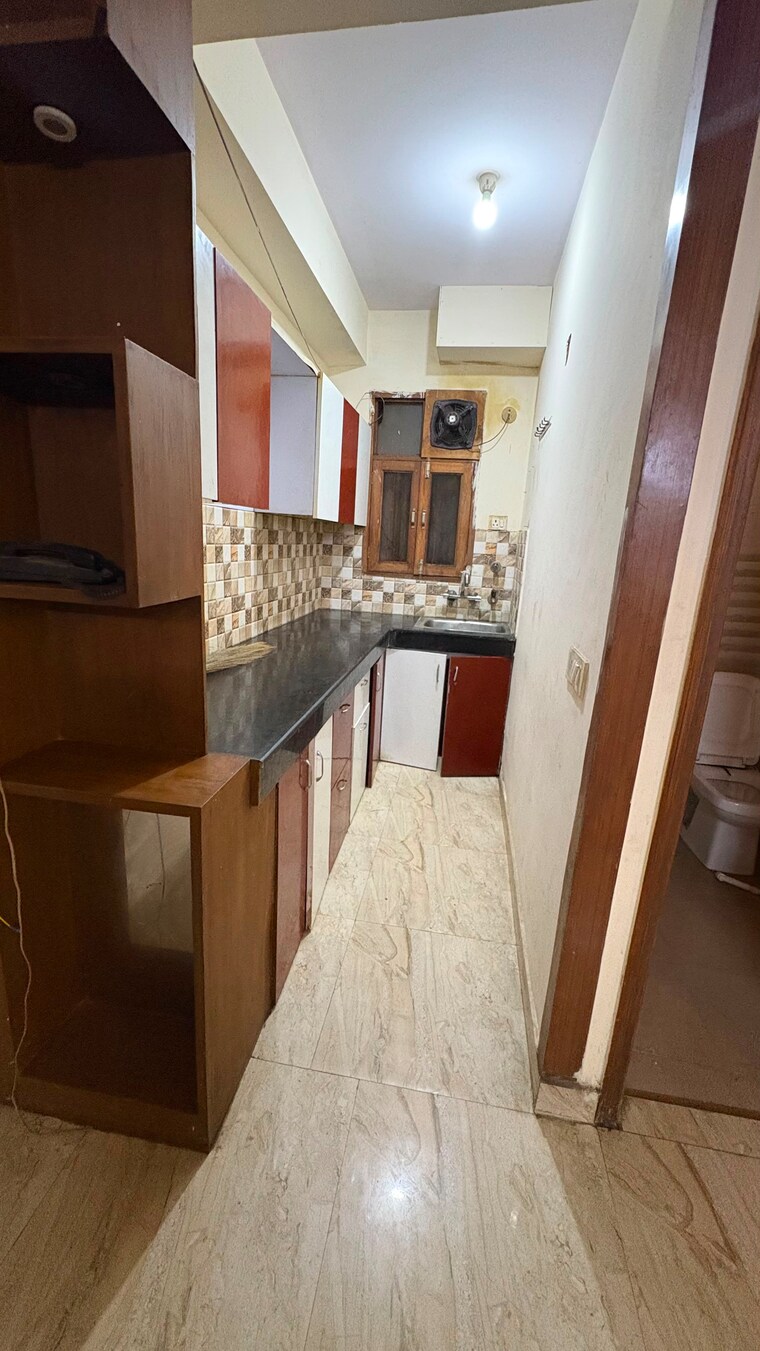 Kitchen, paradise-homz 2 Bedroom 950 Sq.Ft. Builder Floor In Sector 45 Noida 10556312