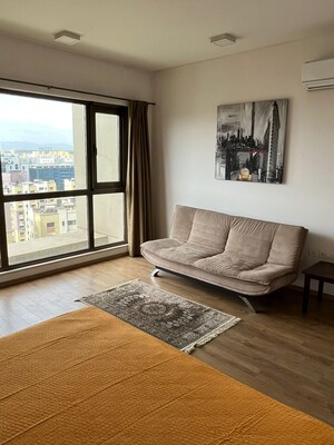 Living Room in 3.5 BHK Apartment at Panchshil One North, Magarpatta City – for Rent