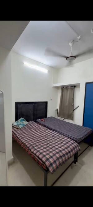 Bedroom in 2 BHK Apartment at Belvalkar Yoganand Park, Kothrud – for Rent