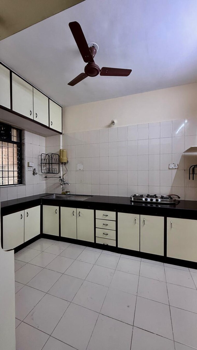 Kitchen, nikash-skies-chs 3 Bedroom 1500 Sq.Ft. Apartment In Pashan Pune 10562204