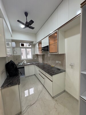 Kitchen in 2.5 BHK Apartment at Smart World Gems, Sector 89 – for Rent