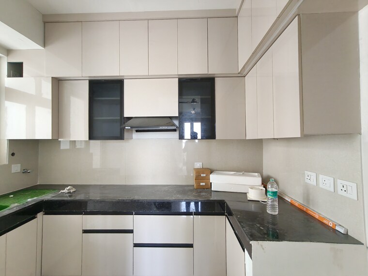 Kitchen, eldeco-live-by-the-greens 3 Bedroom 1404 Sq.Ft. Apartment In Sector 150 Noida 10562323