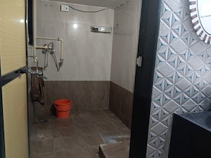 Bathroom in 1 BHK Apartment at Anu Nagar CHS, Vijay Nagari – for Rent