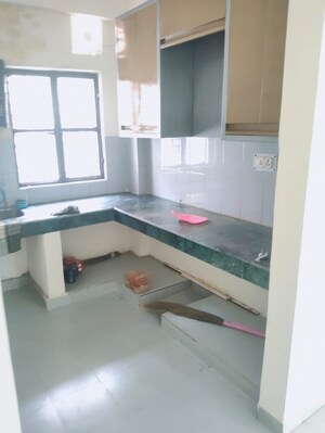 Kitchen in 1 BHK Apartment at UPAVP Brahmputra Enclave, Siddharth Vihar – for Rent