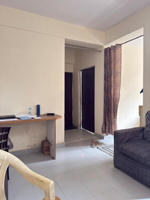 Living Room in 1 BHK Apartment at UPAVP Brahmputra Enclave, Siddharth Vihar – for Rent