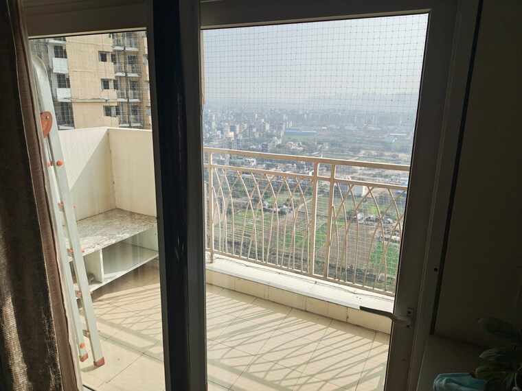 Balcony, gaur-city-2-10th-avenue 2 Bedroom 845 Sq.Ft. Apartment In Sector 16c Greater Noida Greater Noida 10562378
