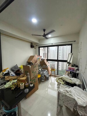 Living Room in 1 BHK Apartment at Lodha Crown Quality Homes, Majiwada – for Rent