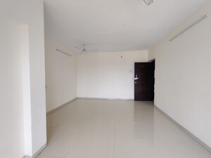 Living Room in 3 BHK Apartment at Romell Diva, Malad West – for Rent