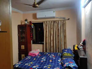 Bedroom in 2 BHK Apartment at Dheeraj Pooja, Malad West – for Rent