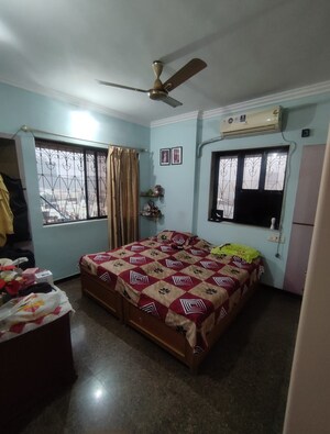 Bedroom in 2 BHK Apartment at Dheeraj Pooja, Malad West – for Rent