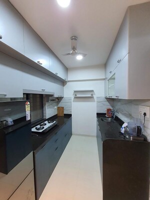 Kitchen in 2 BHK Apartment at Kumar Pebble Park, Hadapsar – for Sale
