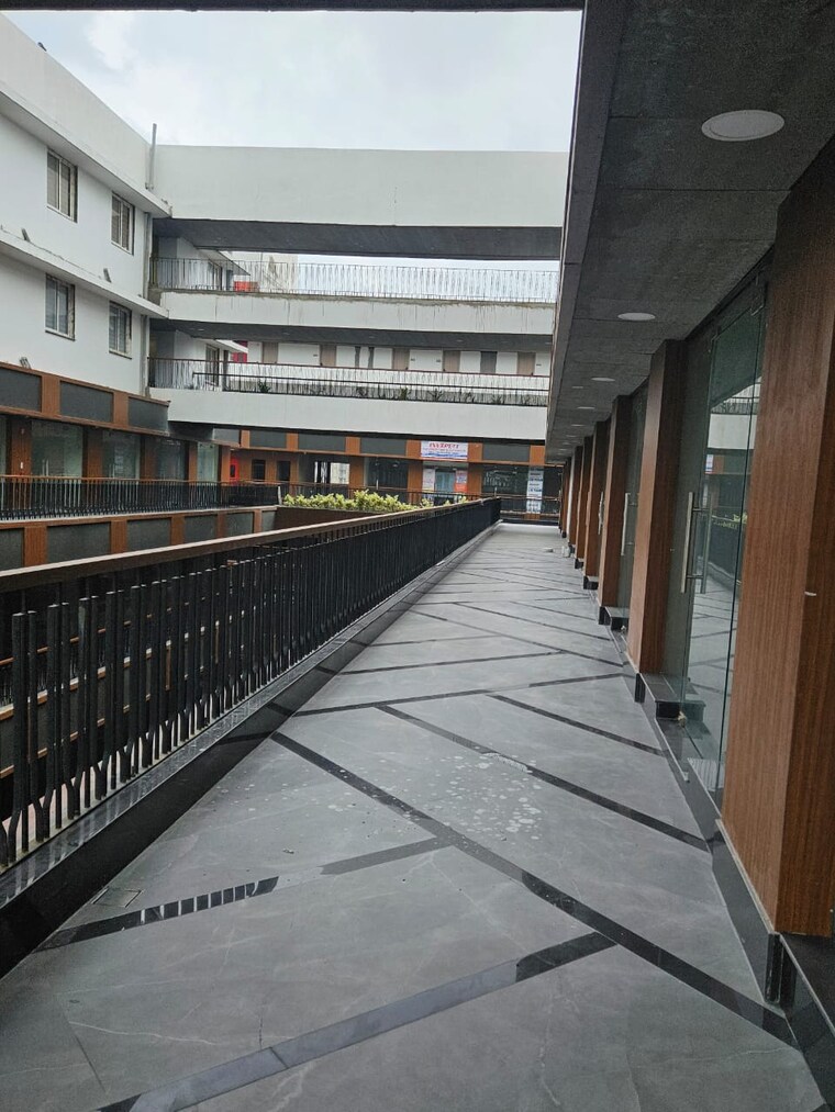 Balcony, sunrise-sun-twilight-metro-street Commercial Shop 480 Sq.Ft. In Sector 27 Yamuna Expressway Greater Noida 10562568