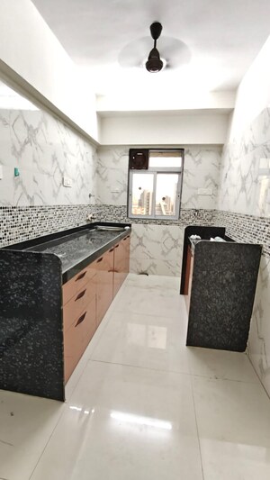 Kitchen in 1 BHK Apartment at DGS Sheetal Tapovan, Malad East – for Rent