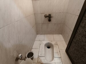 Bathroom in 1 BHK Apartment at Sankalp II, Malad East – for Rent