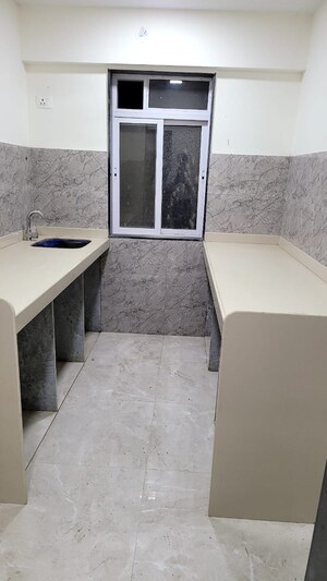 Kitchen in 2 BHK Apartment at Arihant Shankheshwar Heights, Chunabhatti – for Sale