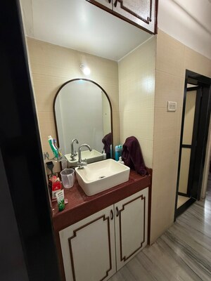 Bathroom in 1 BHK Apartment at Brahmand CHS, Brahmand – for Rent
