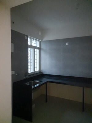 Kitchen in 2 BHK Apartment at Rama Fusion Towers, Hinjewadi – for Rent