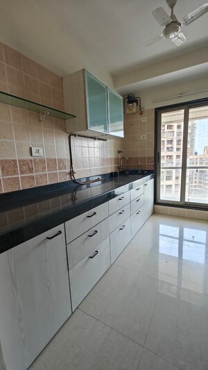 Kitchen in 2 BHK Apartment at DLH New Chandra CHS, Andheri West – for Sale