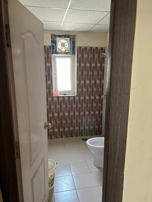 Bathroom in 3 BHK Apartment at Ansal API Celebrity Gardens, Sushant Golf City – for Rent