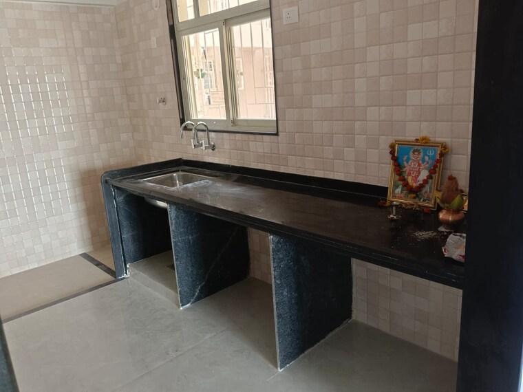 Kitchen, sai-elouera 3 Bedroom 900 Sq.Ft. Apartment In Wakad Pune 10562747