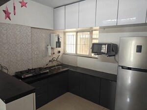 Kitchen in 2 BHK Apartment at Yash Wisteria, Wakad – for Rent