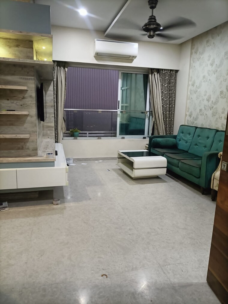 Living Room, romell-aether 2 Bedroom 950 Sq.Ft. Apartment In Goregaon East Mumbai 10562810