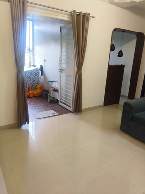 Living Room in 1 BHK Apartment at Suyog Saffron, Pimple Saudagar – for Rent