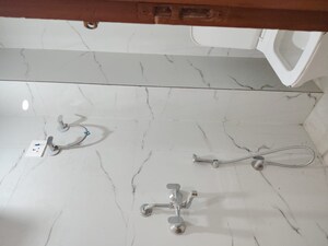 Bathroom in 1 BHK Builder Floor at Chattarpur – for Sale