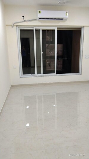 Room in 1 BHK Apartment at Ruparel Elara, Kandivali West – for Rent