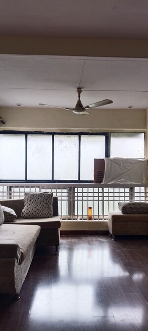 Living Room in 1 BHK Apartment at Horizon CHS, Andheri West – for Rent