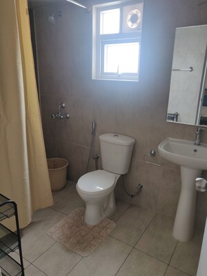 Bathroom in 3 BHK Apartment at Prestige Royale Gardens, Doddaballapur Road – for Rent