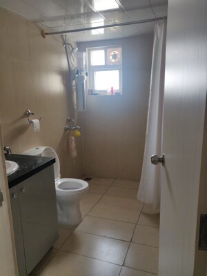 Bathroom in 3 BHK Apartment at Prestige Royale Gardens, Doddaballapur Road – for Rent