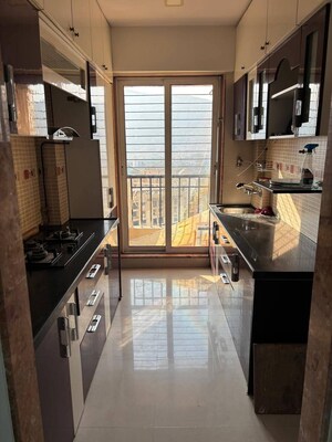Kitchen in 2 BHK Apartment at Vijay Apartments Waghbil, Waghbil – for Sale
