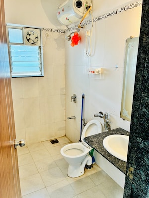 Bathroom in 2 BHK Apartment at Gera Park View, Kharadi – for Rent