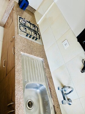 Kitchen in 2 BHK Apartment at Gera Park View, Kharadi – for Rent