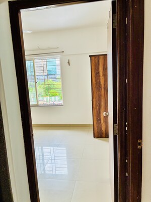 Room in 2 BHK Apartment at Gera Park View, Kharadi – for Rent