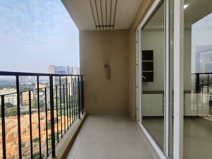 Balcony in 2 BHK Apartment at Bhartiya Nikoo Homes Phase 2, Thanisandra Main Road – for Rent