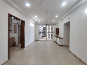 Living Room in 2 BHK Apartment at Bhartiya Nikoo Homes Phase 2, Thanisandra Main Road – for Rent