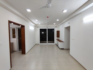 Living Room in 2 BHK Apartment at Bhartiya Nikoo Homes Phase 2, Thanisandra Main Road – for Rent