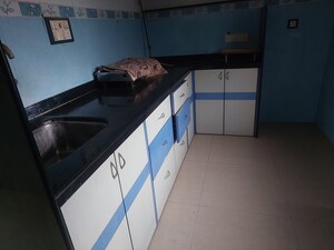 Kitchen in 1 BHK Apartment at Piramal Nagar CHS, Goregaon West – for Rent