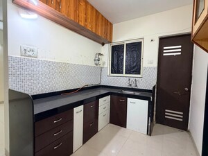 Kitchen in 3 BHK Apartment at Swadesh Greenhills, Baner – for Rent
