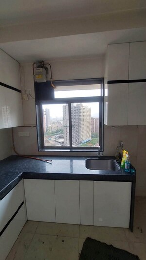 Kitchen in 1 BHK Apartment at Runwal Eirene, Balkum Pada – for Rent