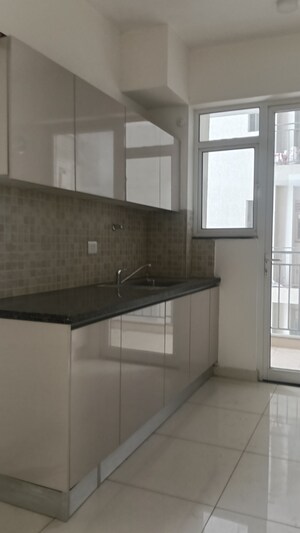 Kitchen in 2 BHK Apartment at Godrej Woods, Sector 43 – for Rent
