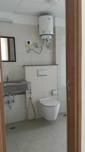 Bathroom in 2 BHK Apartment at Godrej Woods, Sector 43 – for Rent