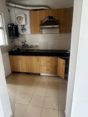 Kitchen in 2.5 BHK Apartment at Apex Athena, Sector 75 – for Rent