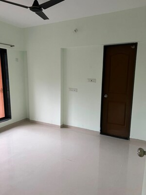 Room in 2 BHK Apartment at Dhariwal Siddharth Nagar Swami Vivekanand CHSL, Goregaon West – for Rent
