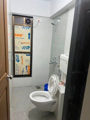 Bathroom in 2 BHK Apartment at Dhariwal Siddharth Nagar Swami Vivekanand CHSL, Goregaon West – for Rent