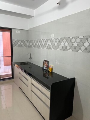 Kitchen in 2 BHK Apartment at Dhariwal Siddharth Nagar Swami Vivekanand CHSL, Goregaon West – for Rent